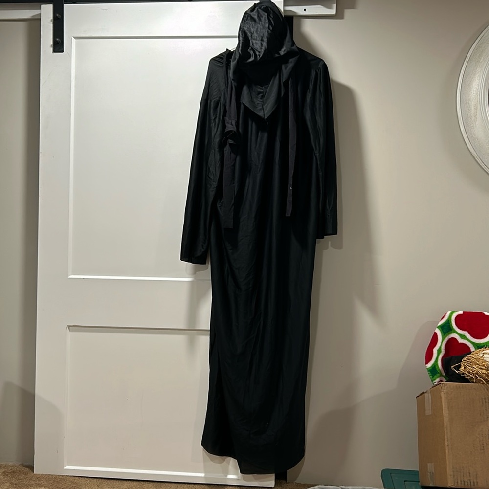 Black one piece costume with black out face/hood. Size Large